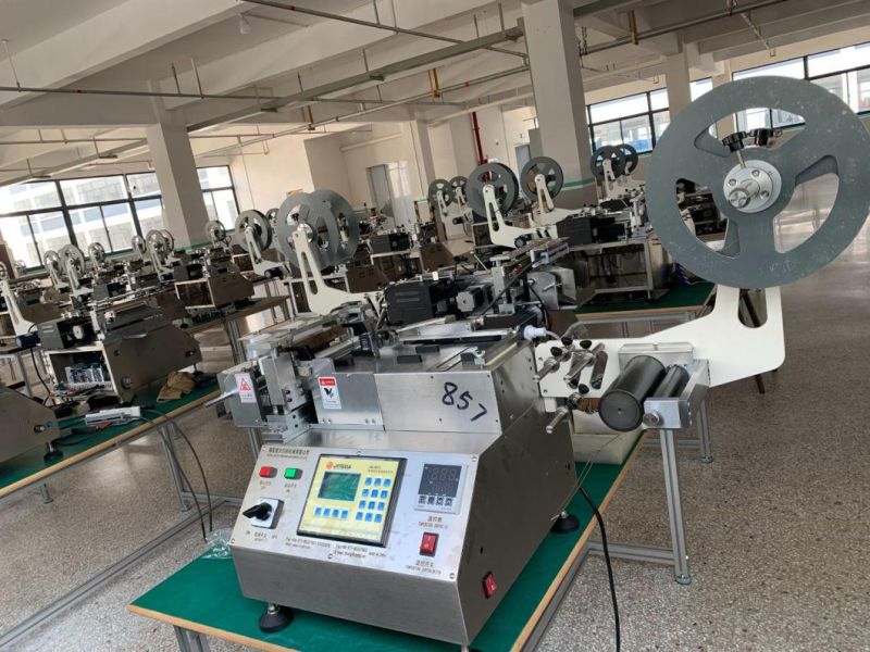 10-100mm Width Desktop Small Size High Speed 600PCS/Min T- Shirts Nylon Taffeta Care Label Cutting Machine for Cotton Tape and Satin Ribbon Labels Jq-3010b