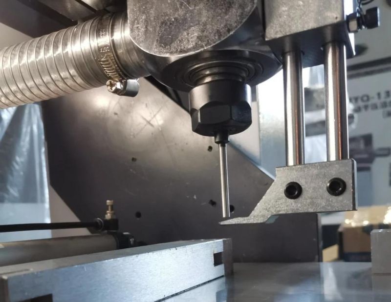 Automatic Hole Drilling Machine for Tags Label Trademark Automatic Drilling (650)